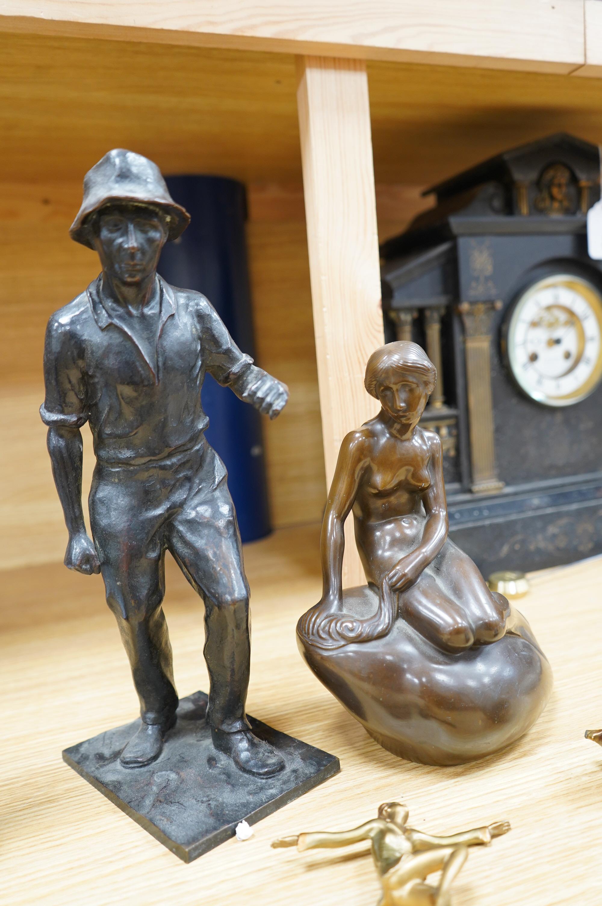 Five figural metal sculptures: a Copenhagen sculpture, signed Edvard Eriksen R.A, an Art Nouveau style bronze of a female figure stamped and dated, an enamelled figure of a musical Pierrot, another of a male figure and a